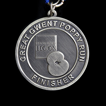 Close up of Great Gwent Poppy Run Finisher 50mm Gold Antique Finish Sports Medal