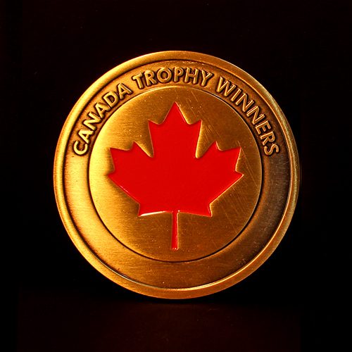 The gold antique Sea Cadet Corps Commemorative Coin for Canada Trophy Winners