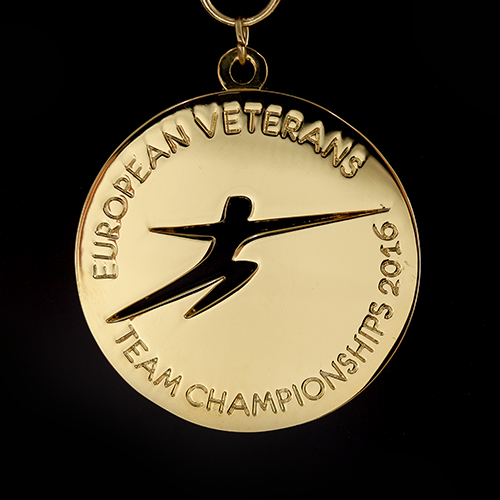 The European Veterans Fencing Team Championship Sports Medals were produced in gold by Medals UK and featured a fetching cut out of the fencing logo