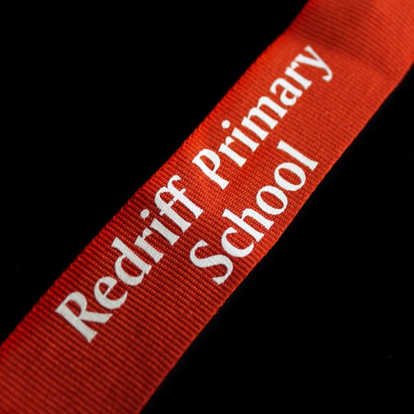 Close up image of 50mm Gold Frosted Polished Redriff Attendance Schools Medal