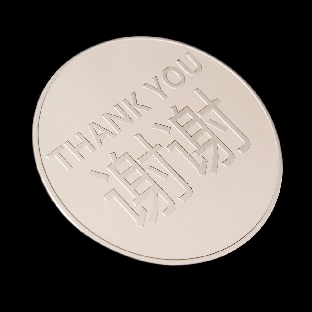 Reverse of AVCC Commemorative Coin for the IVCC with the words thank you in English and Chinese