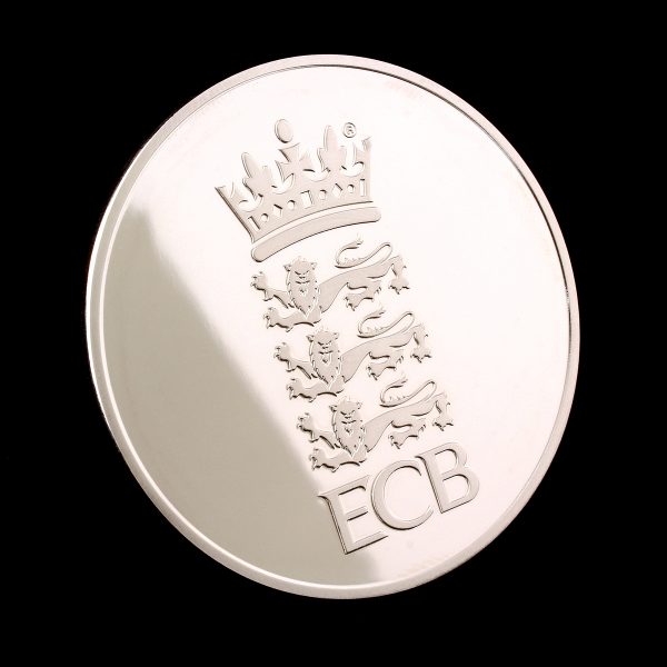 England and Wales Cricket Board Commemorative Coins on black background reflection