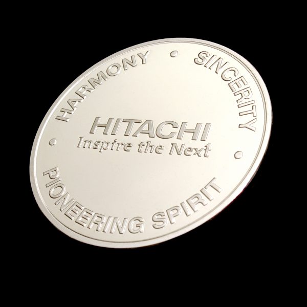 Close up of reverse of Hitachi Rail Europe coin