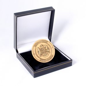 50mm Gold Antique Smooth Commemorative Coin In A Black Leatherette Case Board of Trade for APS Group in presentation box